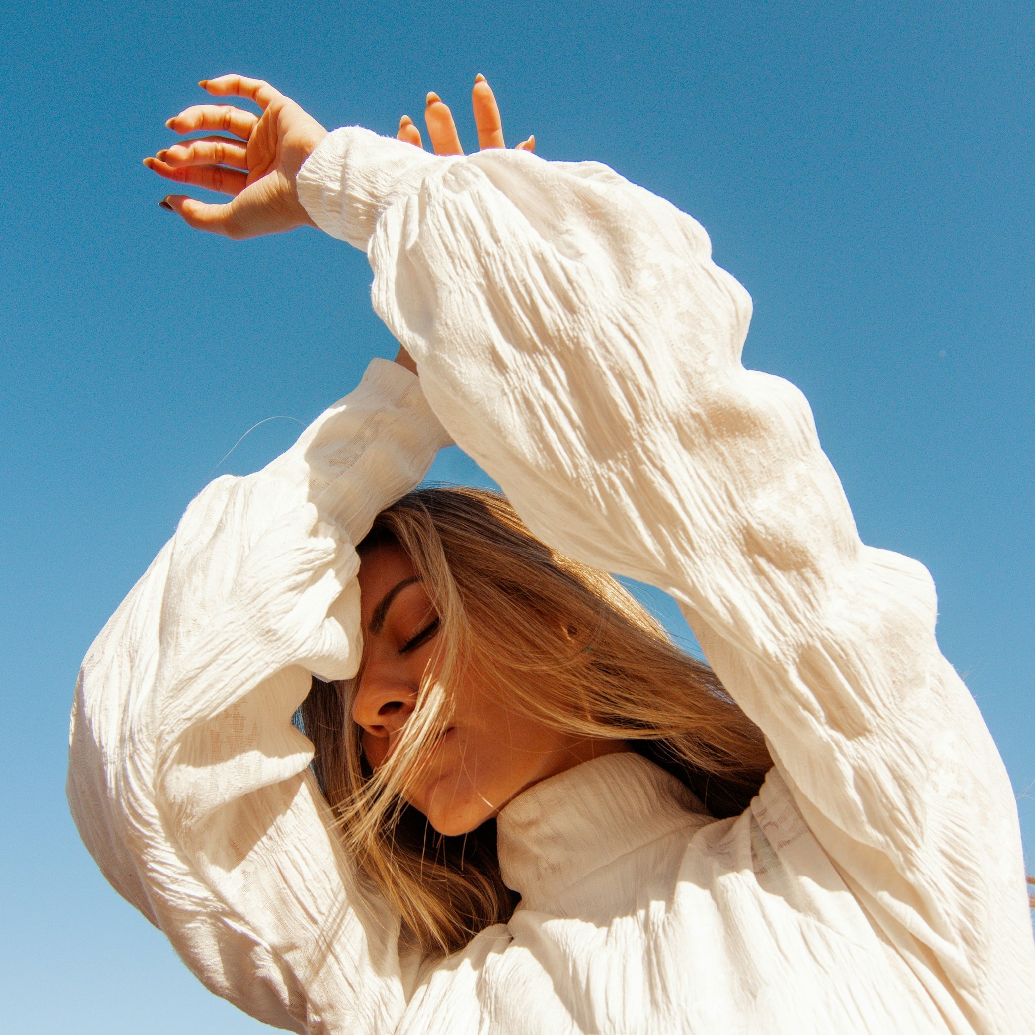 Woman practicing body literacy by listening to her physical signals and resting.